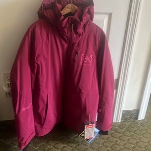 Women’s Burton AK gore flare down jacket.